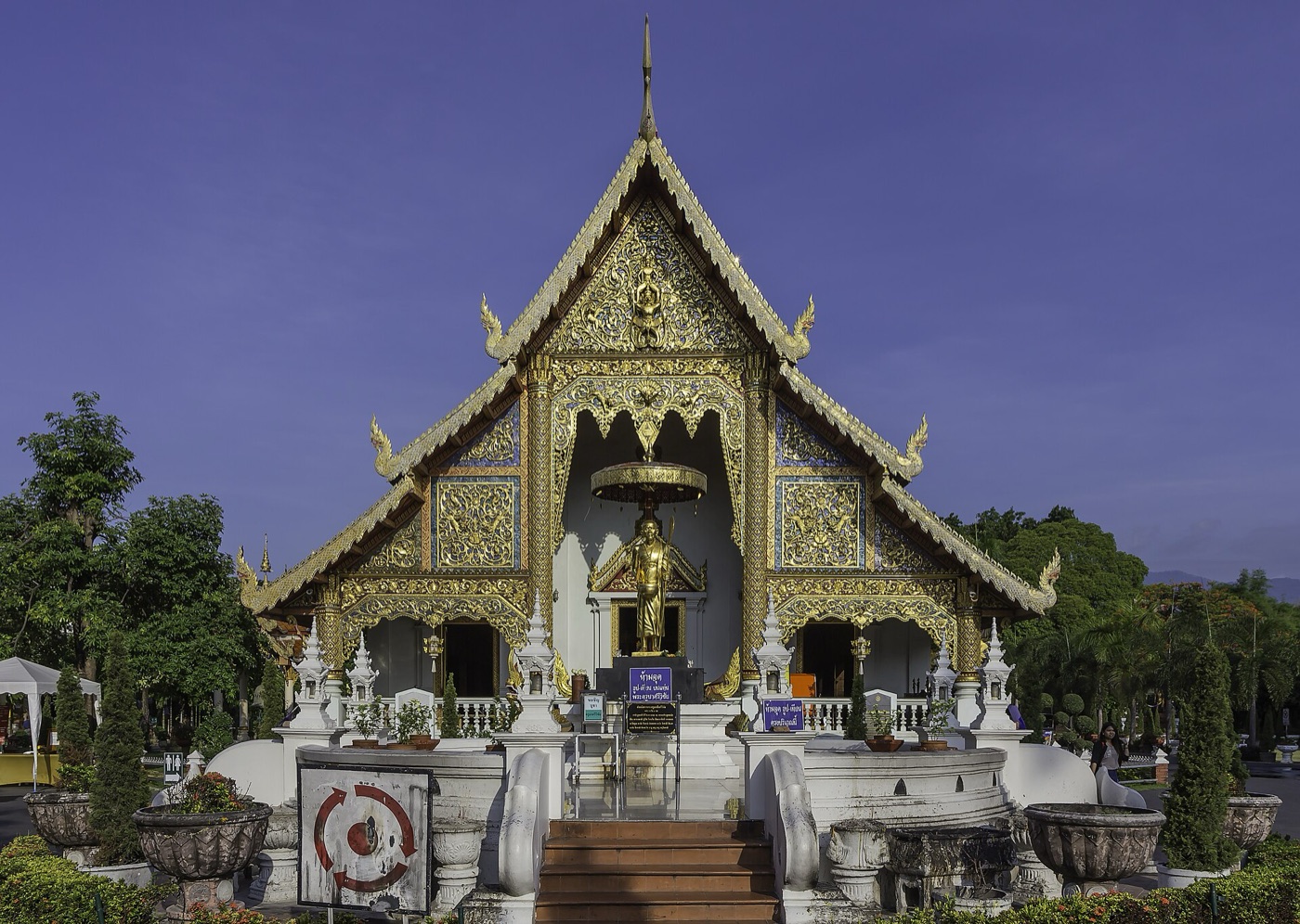 Wat Phra Singh in Chiang Mai beneath a blue sky
